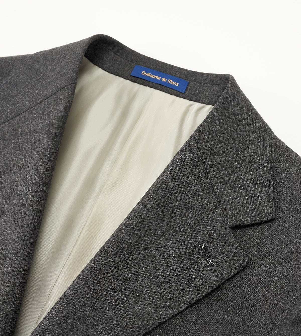 Close-up of the jacket collar construction and hand-finished lapel roll — From Borcelleclothes.