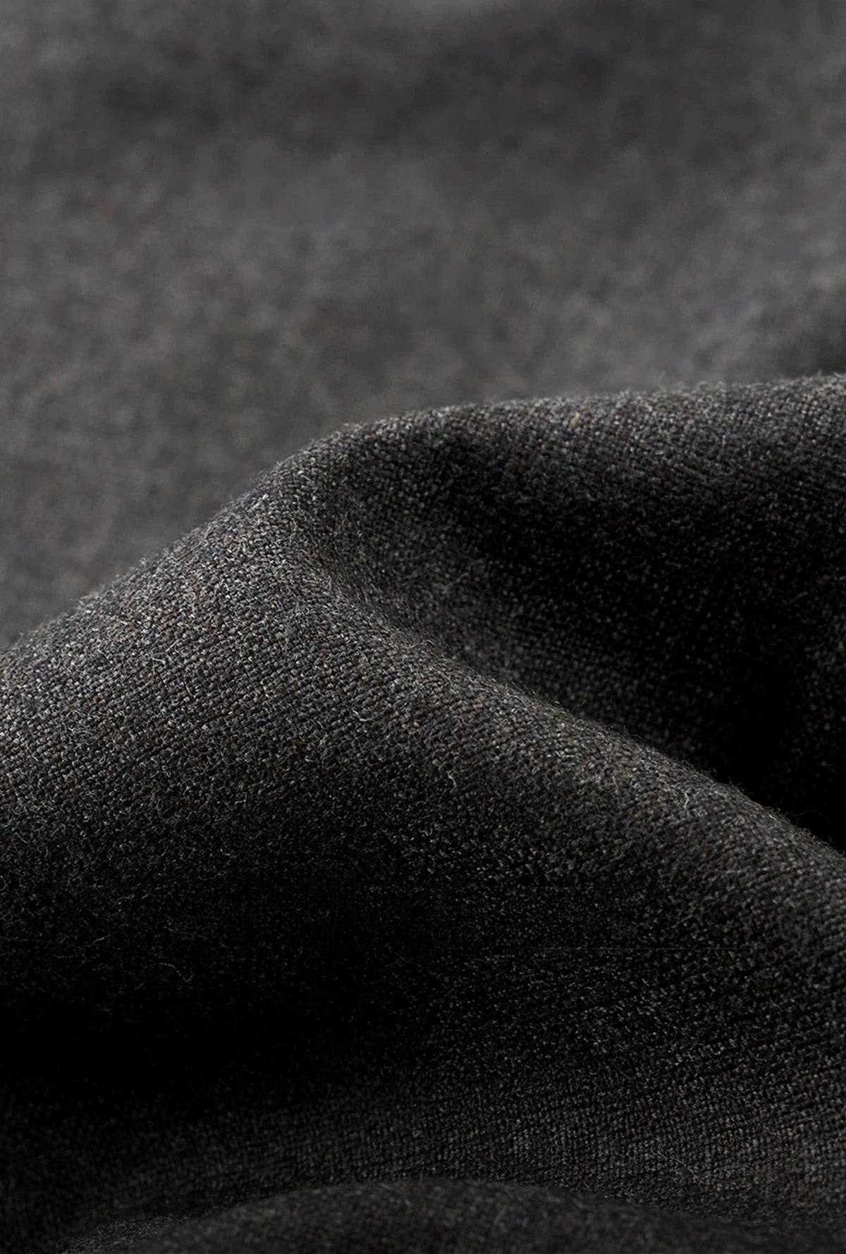Macro texture close-up of Vitale Barberis Canonico Super 110s brushed wool flannel in Portofino charcoal melange — From Borcelleclothes.
