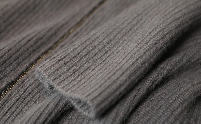 Macro detail of the resilient ribbed sleeve cuff on the Concord 620g pure cashmere cardigan — From Borcelleclothes.