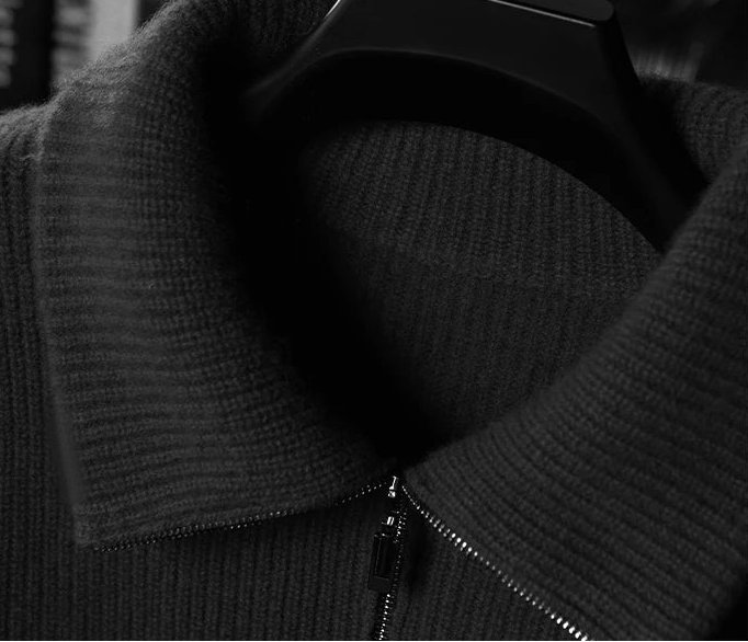 Close-up of the substantial turn-down collar and silver-toned zipper on the Davy’s Grey heavyweight cashmere cardigan — From Borcelleclothes.