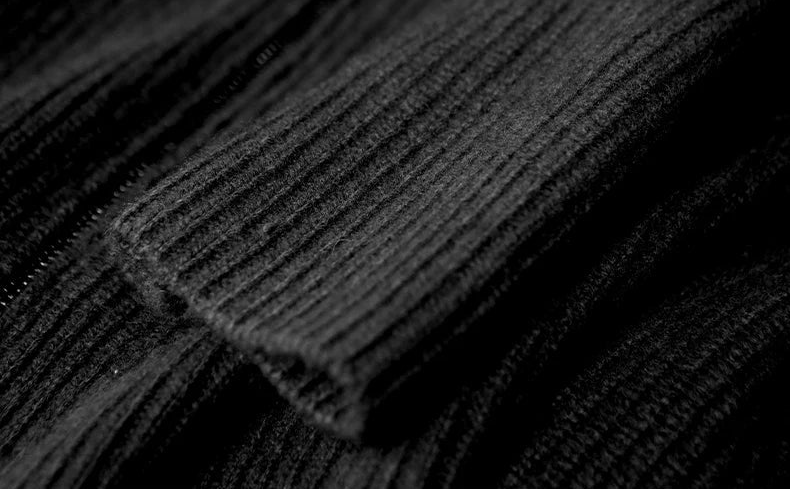 Macro shot of the structured ribbed sleeve cuff on the Davy’s Grey heavyweight cashmere cardigan, showing the dense fiber texture — From Borcelleclothes.