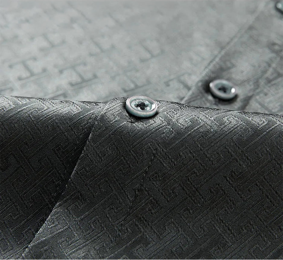 High-contrast shot of the premium tone-on-tone buttons secured along the front placket of the grey silk jacquard shirt — From Borcelleclothes.