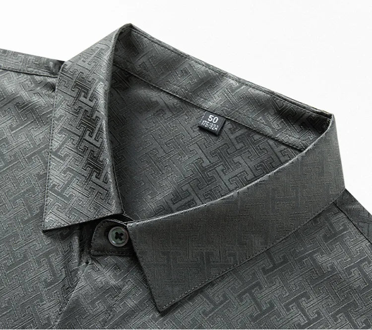 Macro shot of the sharp pointed collar on the men's grey Mulberry silk shirt, revealing the intricate Jacquard Labyrinth weave — From Borcelleclothes.