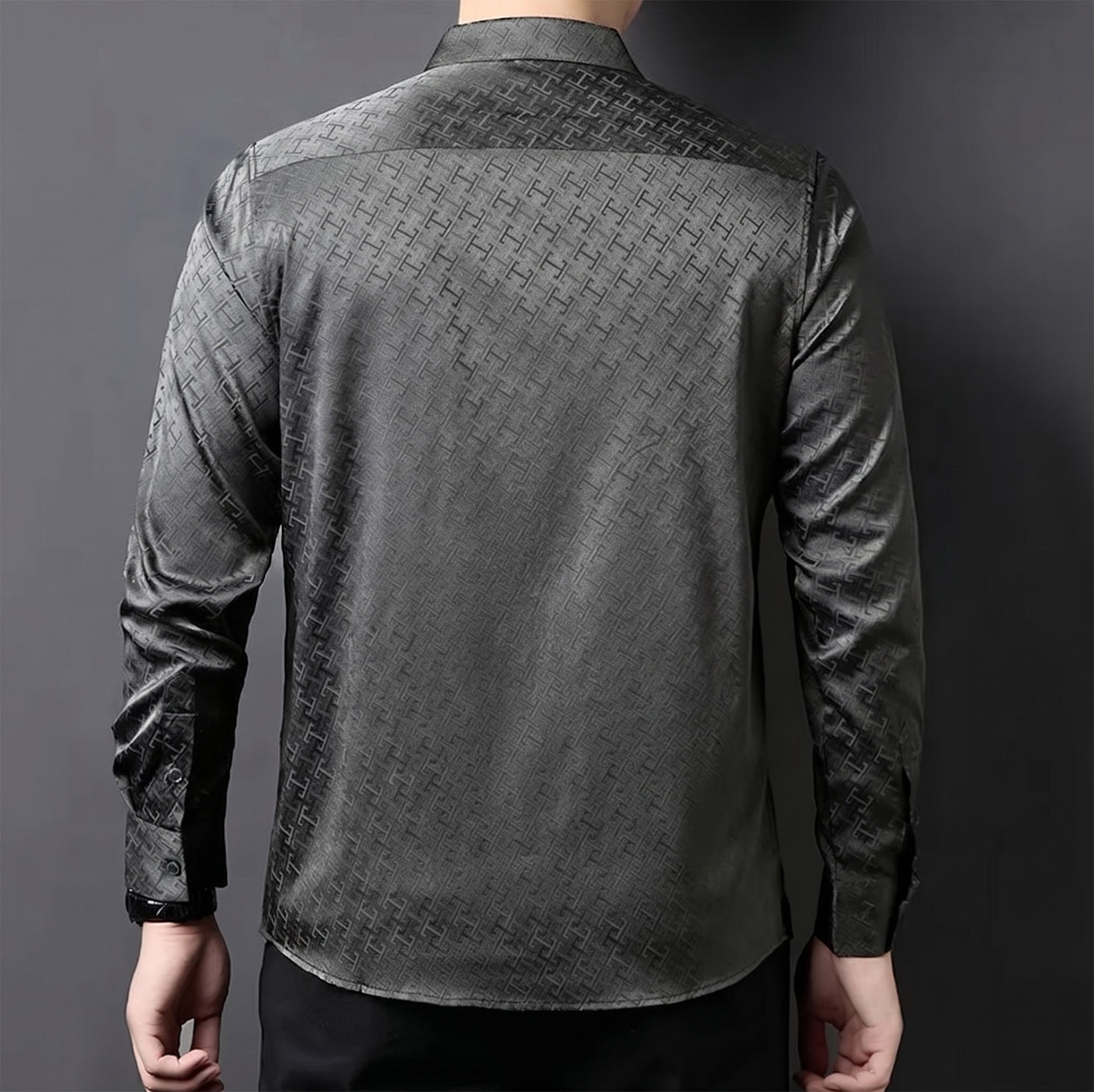 Rear view of a man wearing the premium Graphite Bonds silk shirt, showcasing the precise fit of the classic back yoke and clean shoulder structure — From Borcelleclothes.
