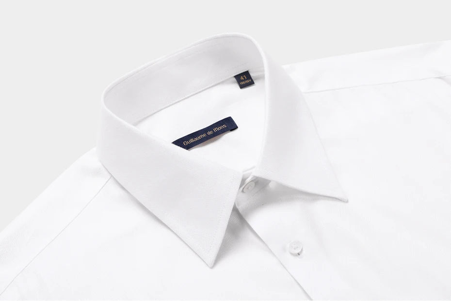 Detailed macro shot of the reinforced pointed collar on the men's Lotus White shirt, engineered to hold its sharp geometry. — From Borcelleclothes.