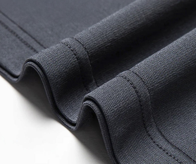 Hemline of Tender Night silk polo — simple, even, and balanced, where the silk weight holds its line naturally. From Borcelleclothes.