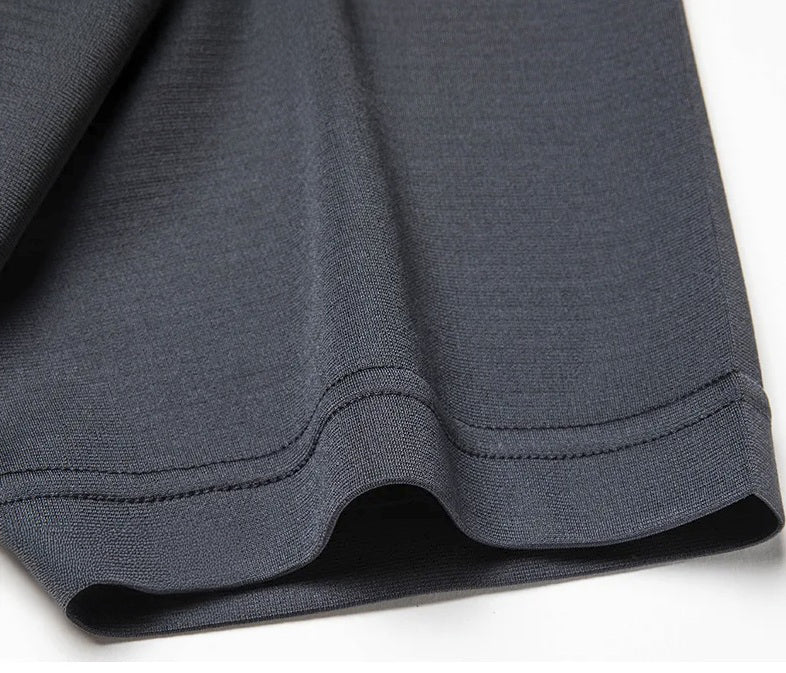 Sleeve of Tender Night silk polo with clean lines and relaxed fit, subtly shaped without rigidity. From Borcelleclothes.