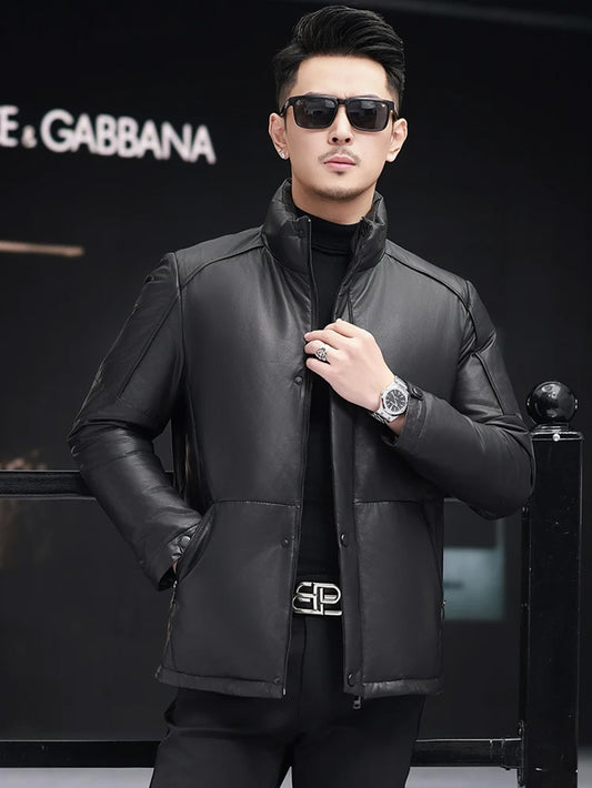 Men’s multiple-panel cowhide jacket in Onyx, unzipped, model touching the front edges — From Borcelleclothes.