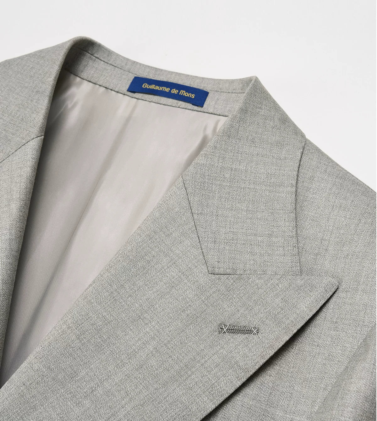 Close-up of wide peak lapel roll with floating canvas construction on Neapolitan jacket — From Borcelleclothes.