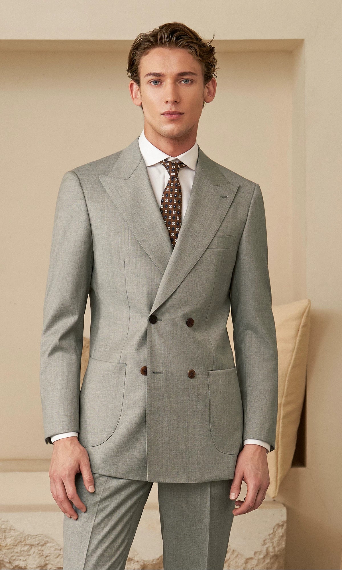 Front full-body view of model standing in Neapolitan VBC Super 110s wool suit — From Borcelleclothes.