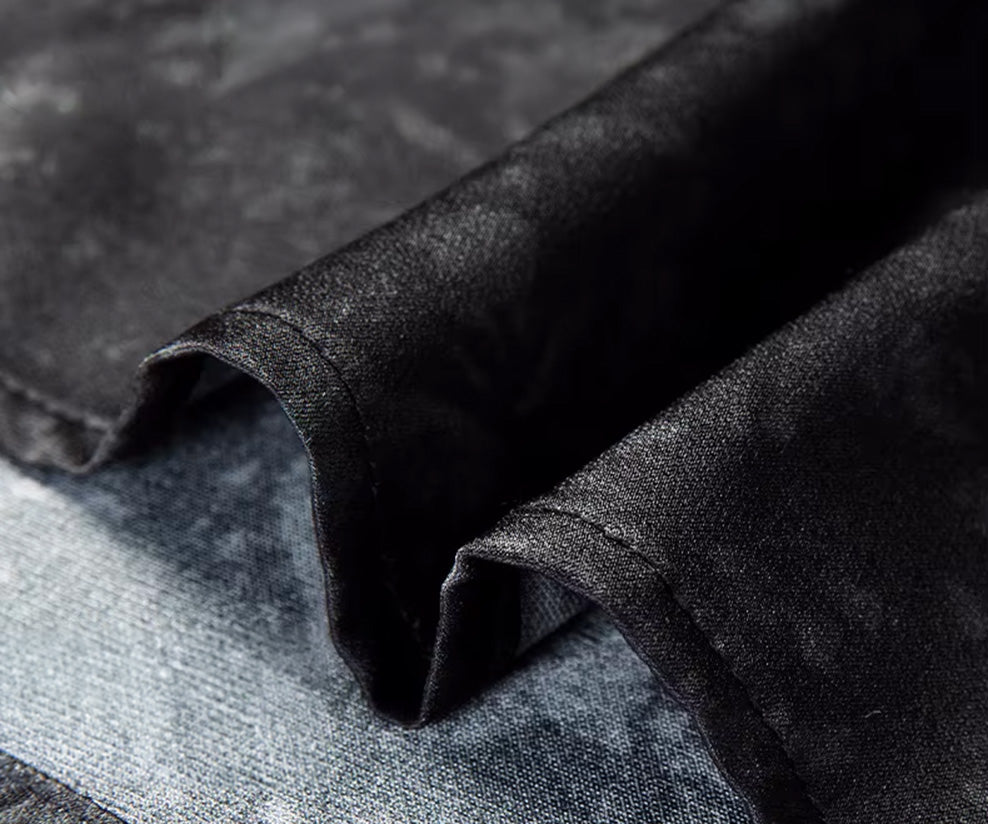 Close-up of the neatly finished bottom hem of the tailored Mulberry silk and elastane shirt, showing the fluid drape of the hemline — From Borcelleclothes.