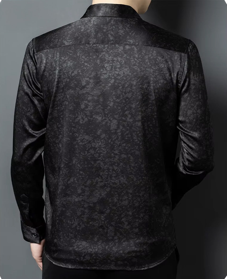 Rear view of a man wearing the premium Noctis Labyrinthus silk shirt, showcasing the immaculate masculine shoulder line and structured back yoke — From Borcelleclothes.