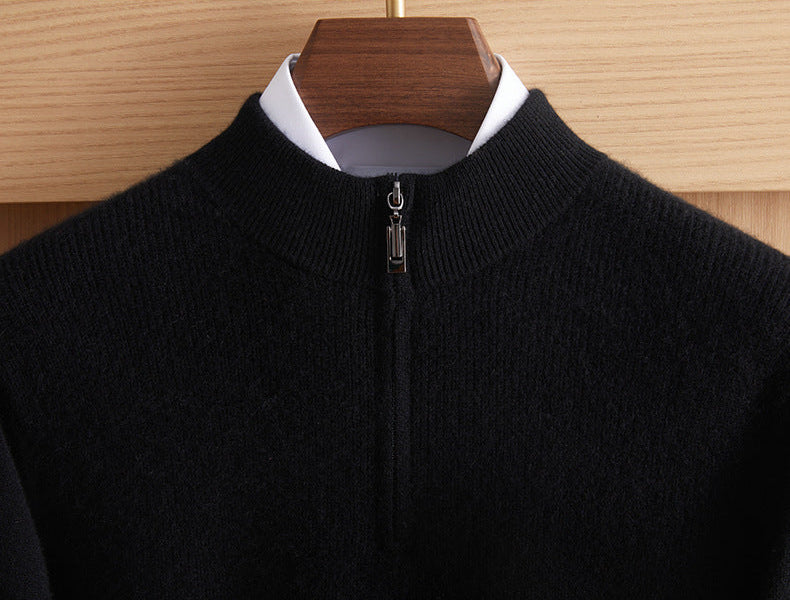 Close-up of the upper section of the men’s Arbas cashmere sweater in Obsidian black, showing the stand collar and concealed half-zip closure — From Borcelleclothes.