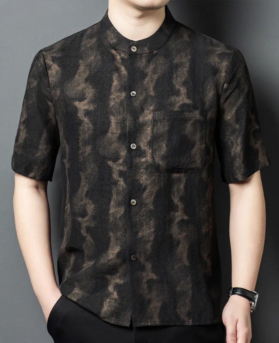 Men's Xiangyunsha silk shirt in Rutilated Graphite color, featuring a unique handmade needle-like amber pattern, on a model with one hand in trousers pocket — From Borcelleclothes.