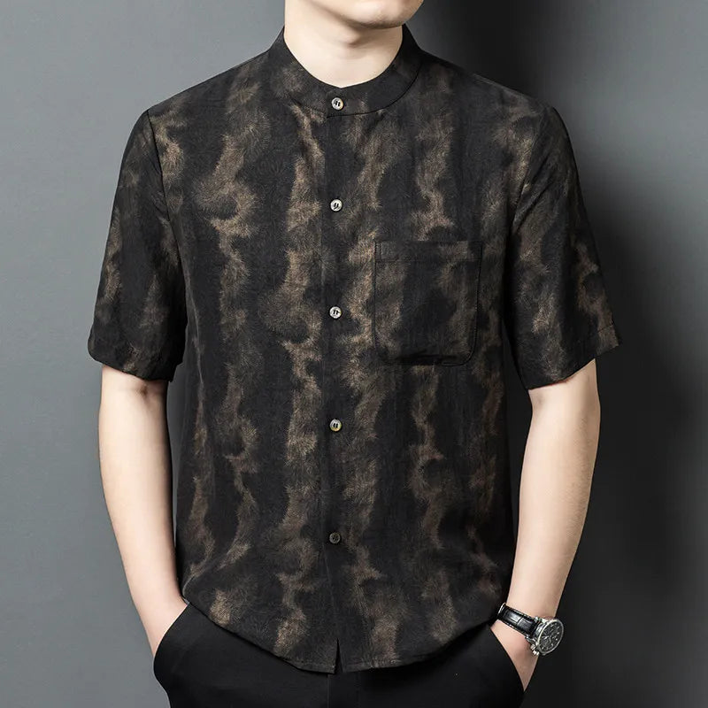 Men's Xiangyunsha silk shirt in Rutilated Graphite color, featuring a band collar and a unique handmade needle-like amber pattern on the matte-graphite monochrome texture. — From Borcelleclothes.