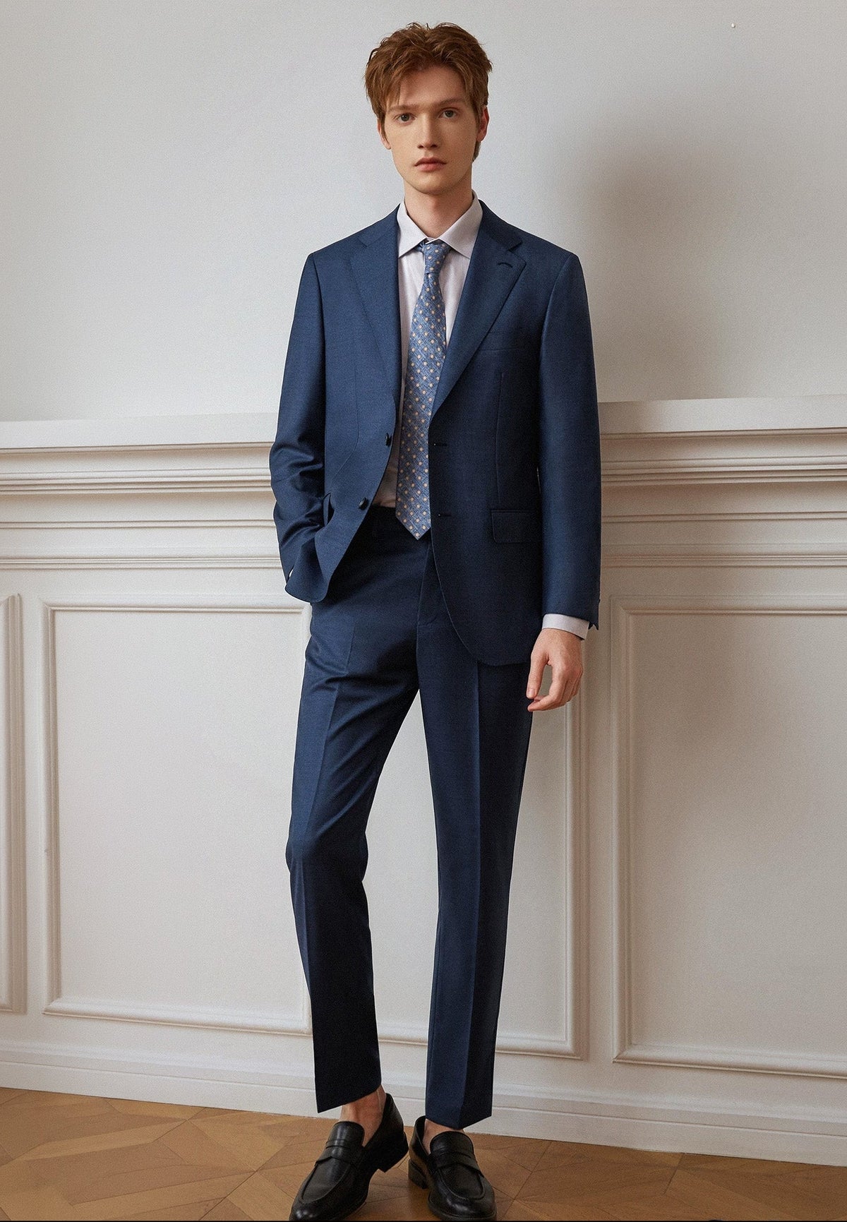 Tailored fit detail of the Salt Wave blue-gray melange wool suit with model's hand in trousers pocket — From Borcelleclothes.