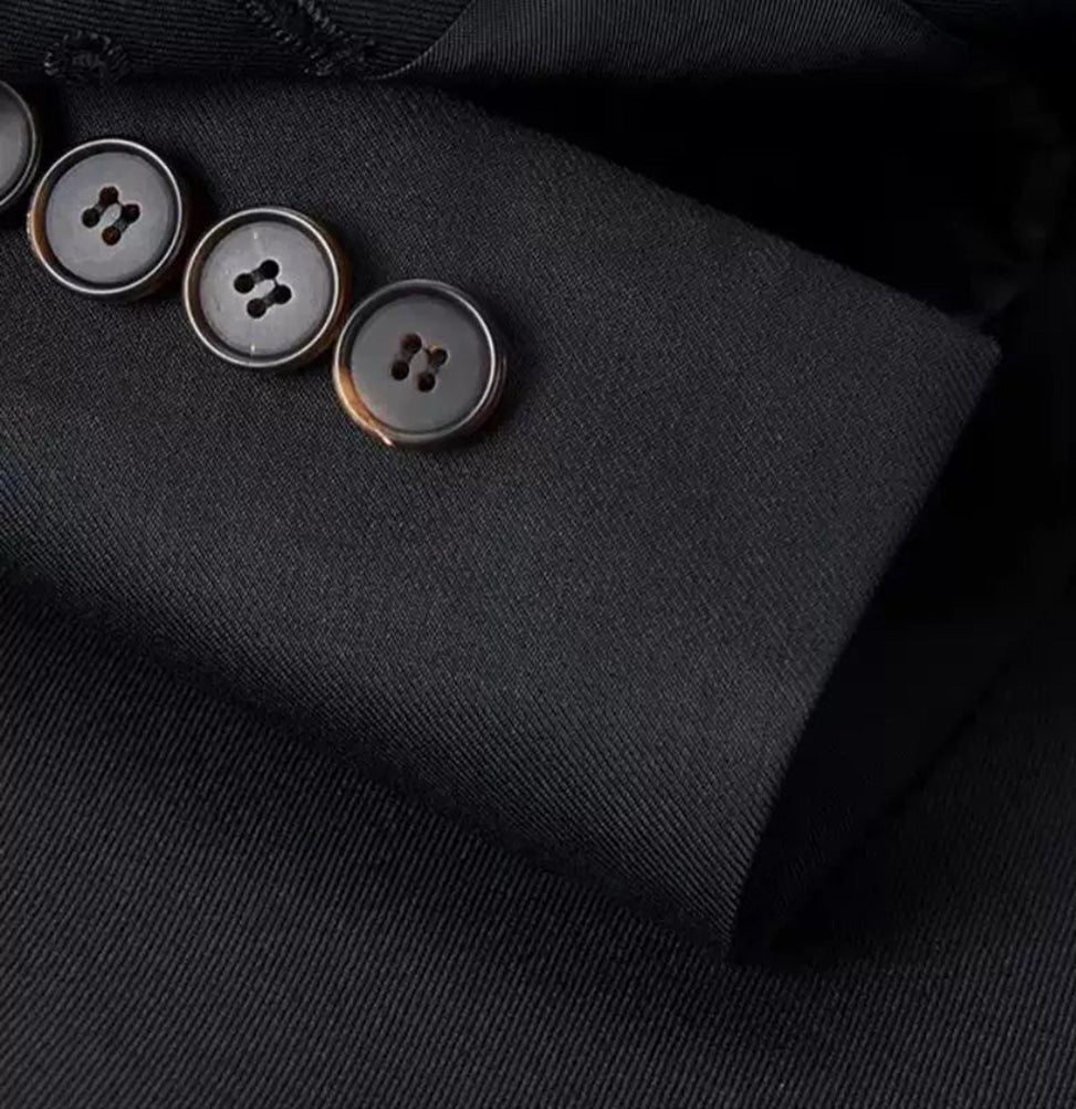 Detail of the unfastened functional surgeon’s cuffs and tailored sleeve construction of the Pianissimo wool blazer — From Borcelleclothes.