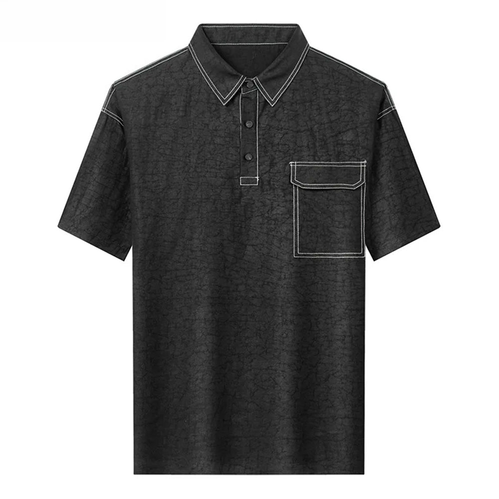 Studio shot of the men's black silk polo shirt, showcasing its fluid front draping, substantial weight, and loose-fitting construction — From Borcelleclothes.