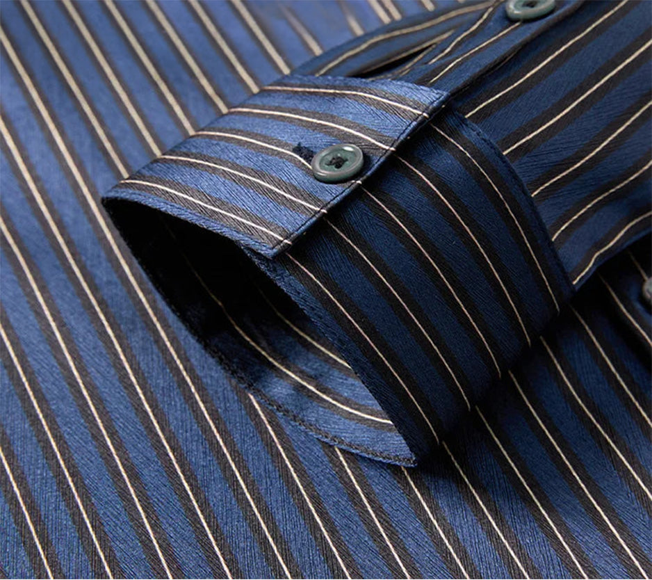 Detailed view of the single-button barrel cuff and sleeve placket on the men's striped herringbone silk shirt in Burning the Midnight Oil — From Borcelleclothes.