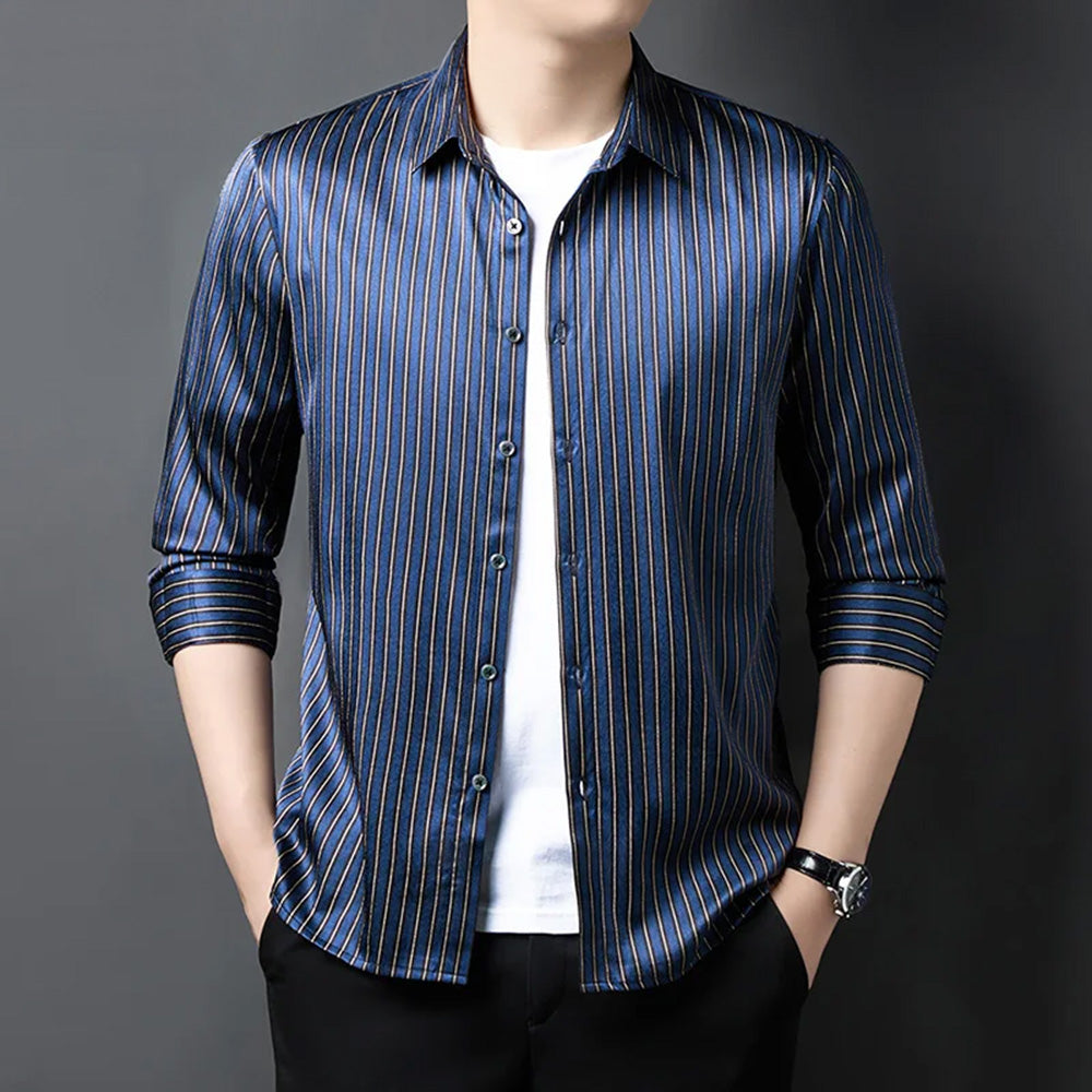 Men's striped print herringbone texture silk shirt in Burning the Midnight Oil, styled unbuttoned with the model's hands in trouser pockets — From Borcelleclothes.