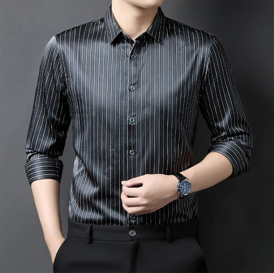 Men's striped print herringbone texture silk shirt in Inky Prose, close-up of the model gently touching the classic front button placket — From Borcelleclothes.