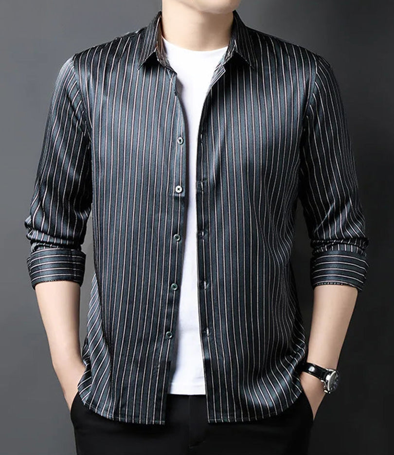 Men's striped print herringbone texture silk shirt in Inky Prose, worn unbuttoned at the collar with the model's hands in trouser pockets — From Borcelleclothes.