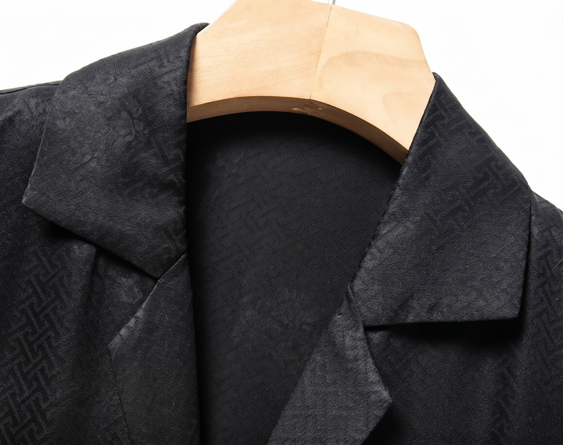 Close-up of the casual Cuban/Camp collar on the men's Beyond Mistletoe shirt-jacket, demonstrating its structured shape and precise, high-end tailoring. — From Borcelleclothes.