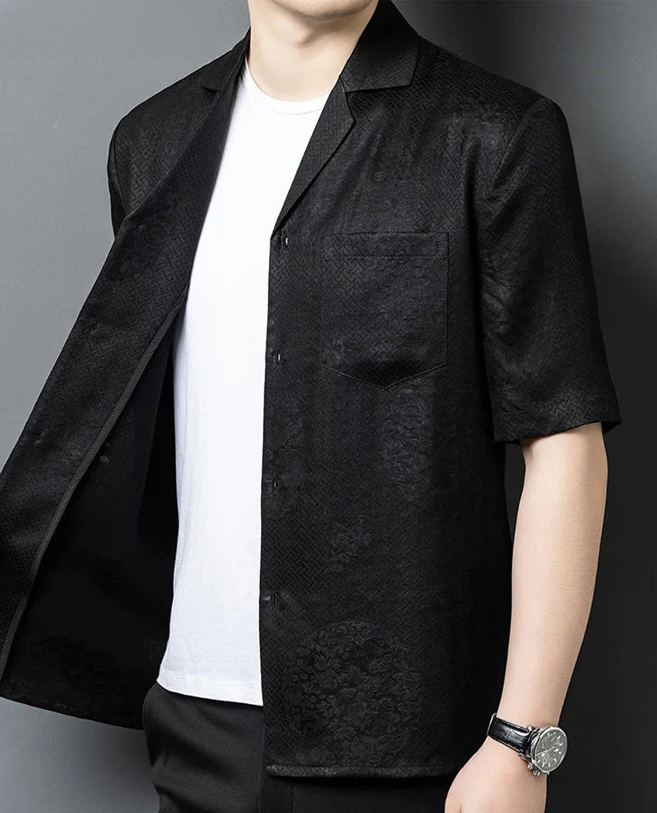 An unfastened men’s silk shirt-jacket revealing the clean, friction-free interior facing construction, emphasizing the flawless "zero-wrong-side" finish of Suzhou weaving. — From Borcelleclothes.