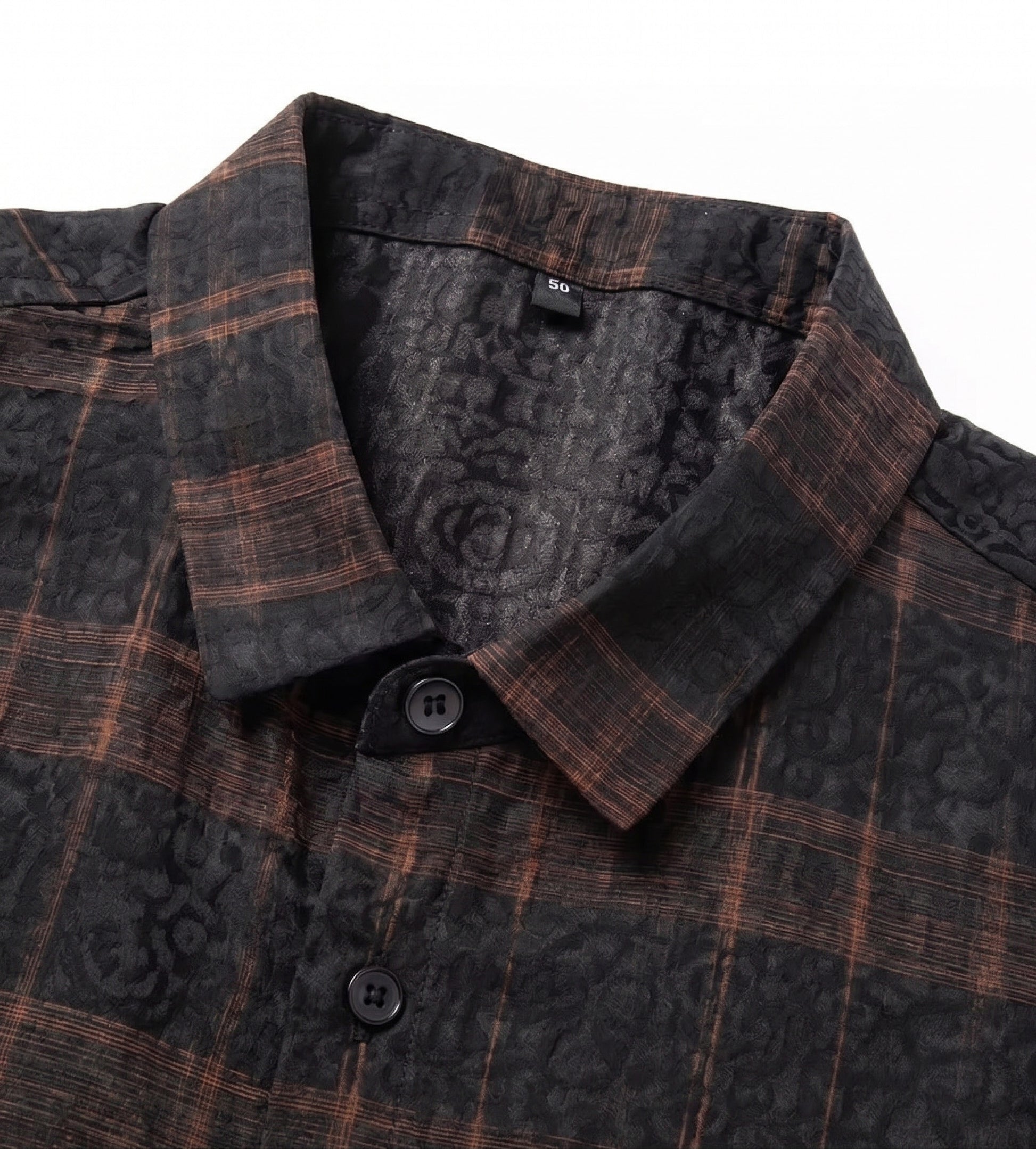 Pointed collar of a men's matte graphite jacquard silk shirt, showcasing the clean lines and cognac check architecture, from Borcelleclothes.