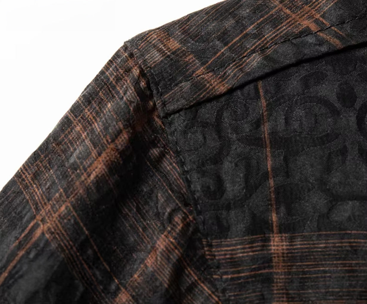 Tailored shoulder panel of a men's short-sleeve graphite silk shirt, displaying the dimensional jacquard texture, from Borcelleclothes.