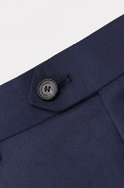 The secure button closure on the pants of the Borcelleclothes Men's VBC Navy Blue Wool Suit with Brass Accents, emphasizing functionality and elegance.