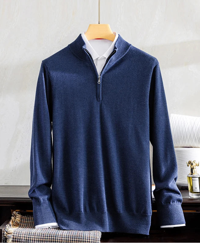 Men's worsted cashmere quarter-zip pullover in Ceylon Sapphire displayed on a wooden hanger with clean tailored drape — From Borcelleclothes.