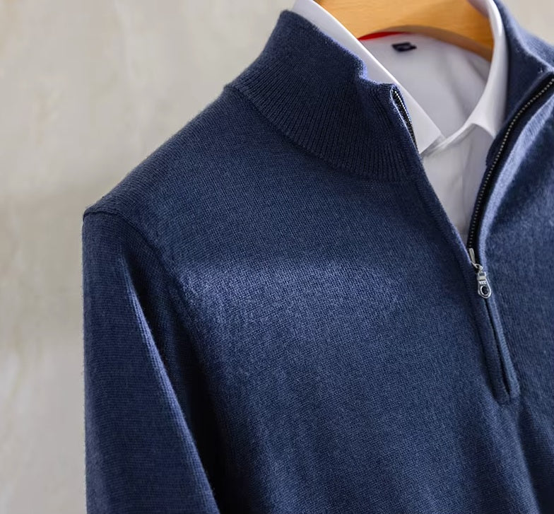Close-up of the 1x1 rib stand collar and metal quarter-zip placket on the Ceylon Sapphire cashmere pullover — From Borcelleclothes.