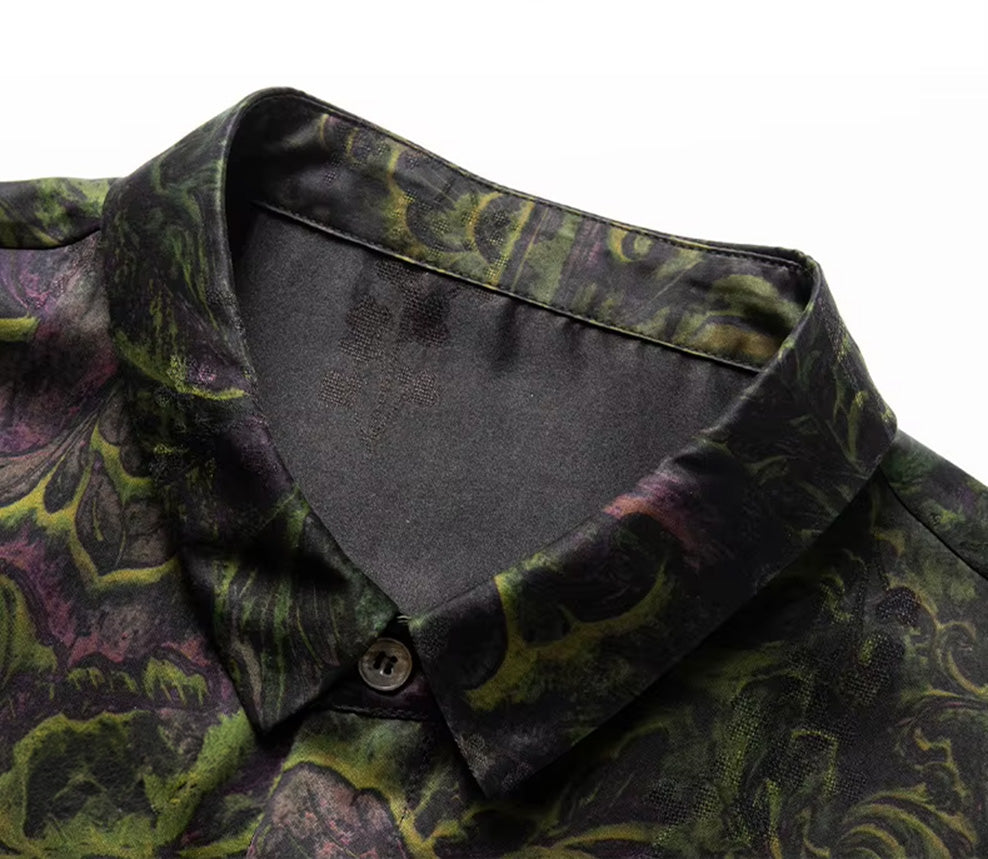Detail shot of the sharp pointed collar on the luxury Xiangyunsha silk shirt in Film Exposure color — From Borcelleclothes.