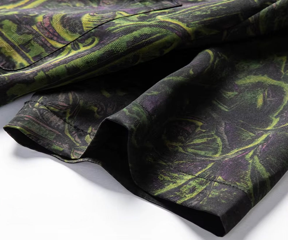 Close-up of the set-in short sleeve, showing the delicate jacquard branch structure and bleeding print contours — From Borcelleclothes.