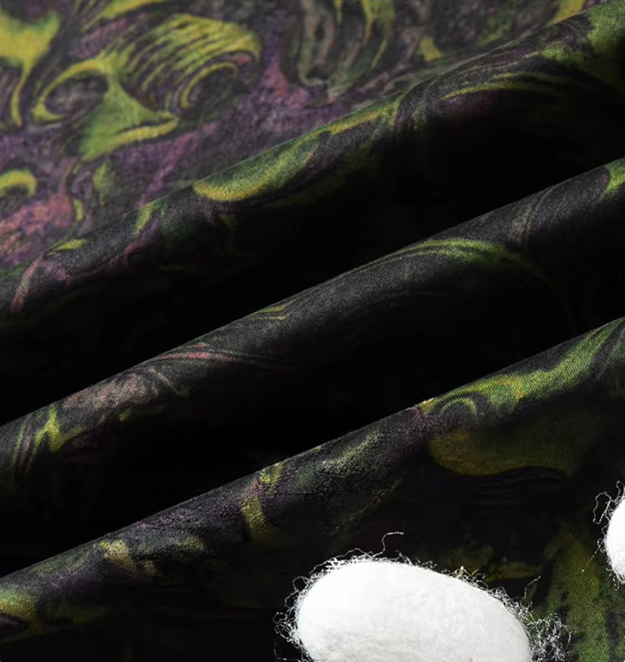 Close-up of the wave-folded texture of the Xiangyunsha mulberry silk jacquard, highlighting the matte analog matrix and foliage print — From Borcelleclothes.
