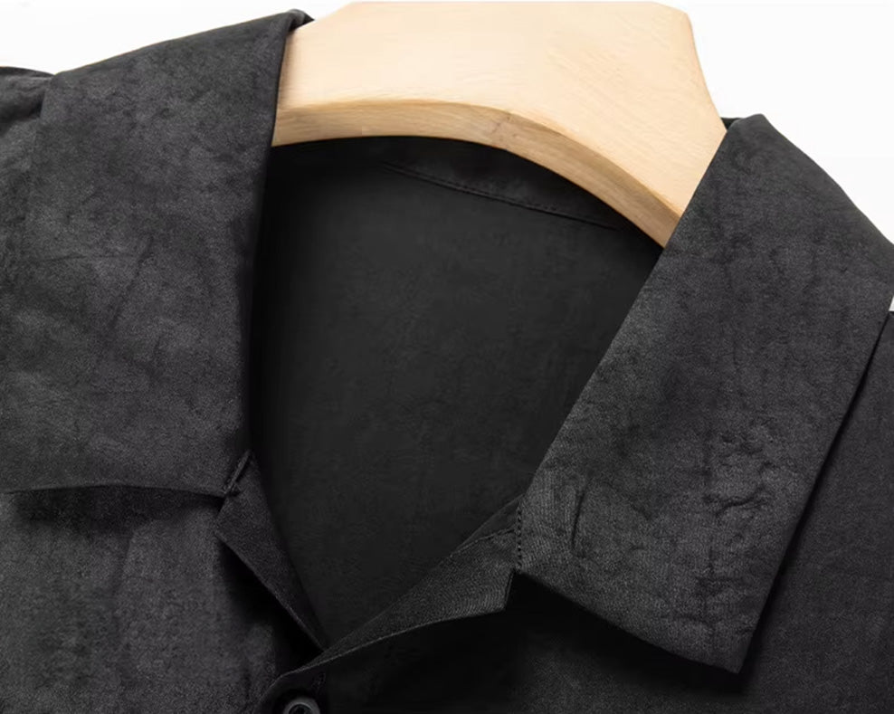 Close-up of the casual Cuban camp collar on the matte Parchment Graphite Xiangyunsha silk shirt-jacket — From Borcelleclothes.