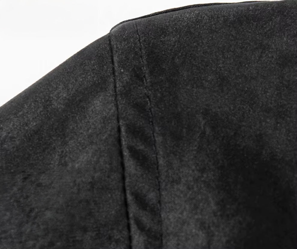 Detailed shot of the tailored dropped shoulder line on the men's matte graphite Xiangyunsha silk overshirt — From Borcelleclothes.