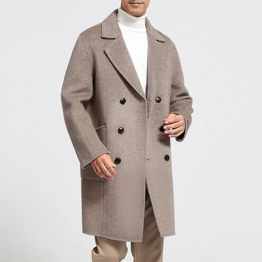 Men’s 900g Wool Coat in Warm Grey—crafted from 100% double-sided wool with handmade construction. Featuring a double-breasted design, six-button closure, notch lapels, and patch pockets for a refined yet versatile silhouette. From Borcelleclothes.