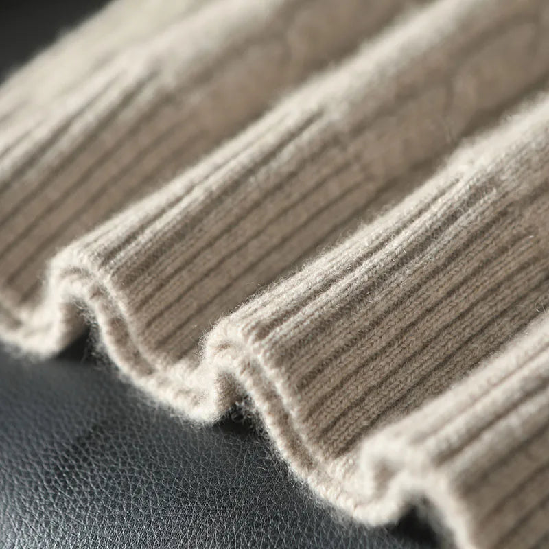 Bottom hem of the cable cashmere sweater in Shaken Not Stirred with visible ribbed structure — From Borcelleclothes.