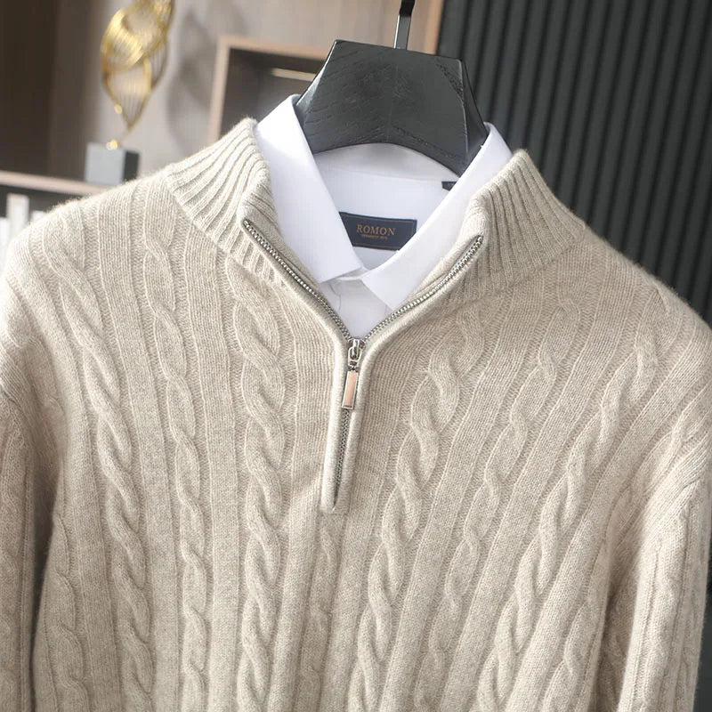 Close-up of the upper part of the cable cashmere sweater in Shaken Not Stirred, featuring braided detailing and mock neck zip — From Borcelleclothes.
