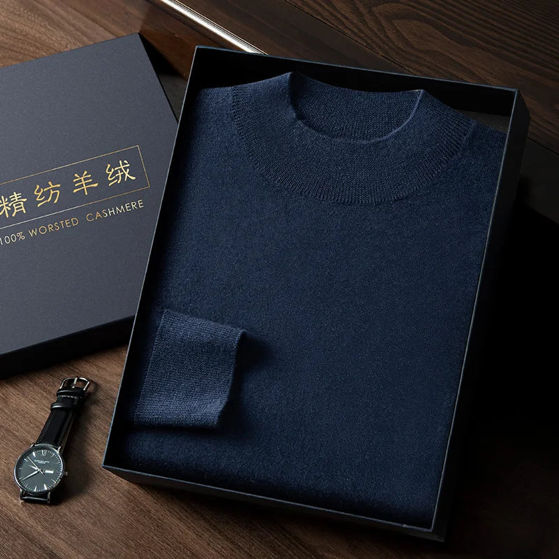 Men’s slim-fitting cashmere sweater in Midnight, featuring plain stockinette stitch with mock neck, dropped shoulders, and ribbed edges — From Borcelleclothes.