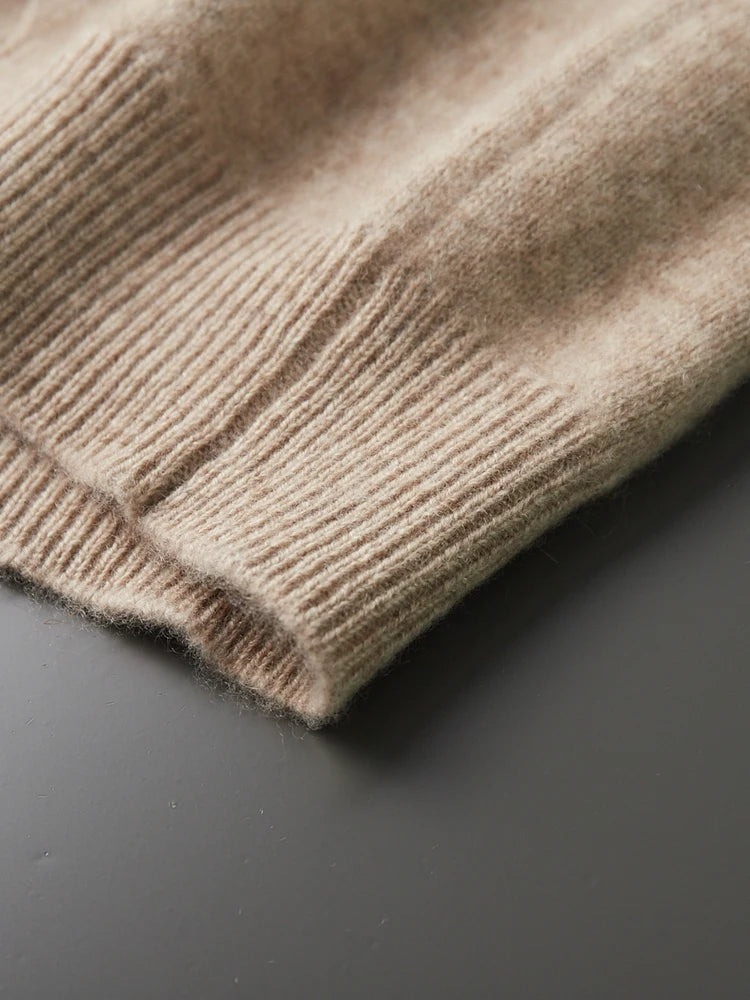 Side seam and hem detail of the Dark Vanilla diamond motif sweater — From Borcelleclothes.