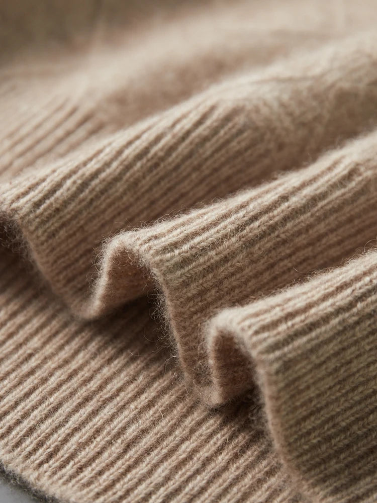 Bottom hem of the Dark Vanilla cashmere sweater in embossed diamond knit — From Borcelleclothes.