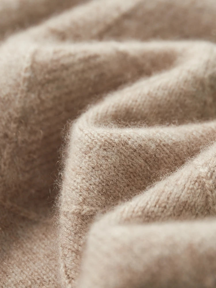 Serpentine folded texture showing the volume of the Dark Vanilla knit — From Borcelleclothes.