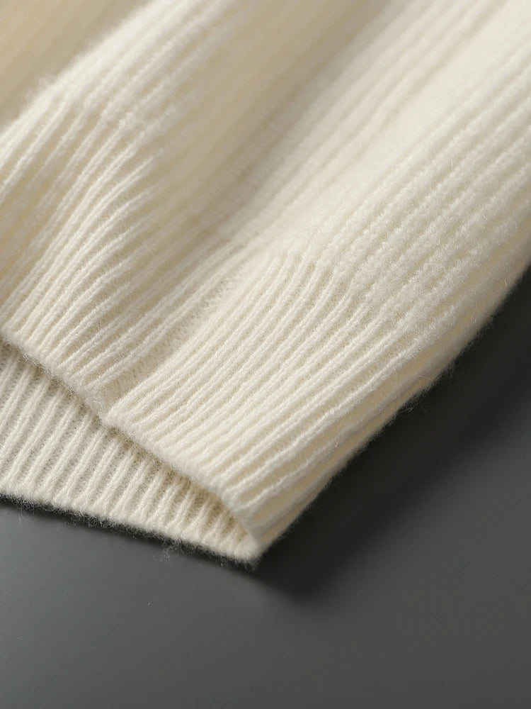 Side seam and bottom hem detail of the men’s White Coffee cashmere sweater — From Borcelleclothes.