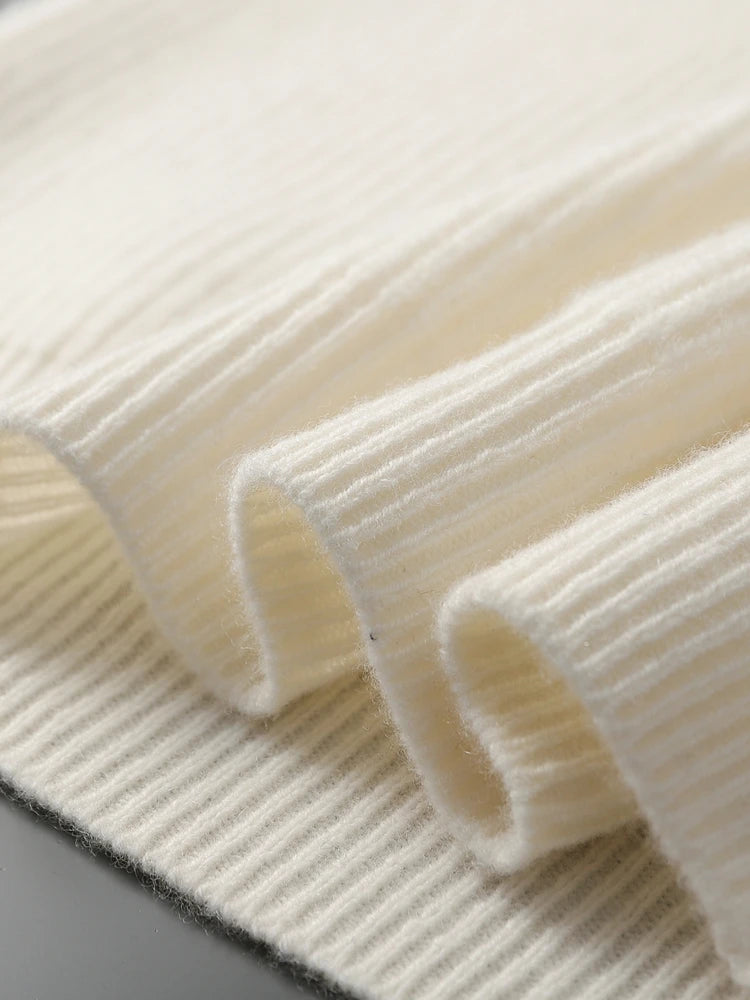 Bottom hem of the men’s White Coffee cashmere sweater — From Borcelleclothes.