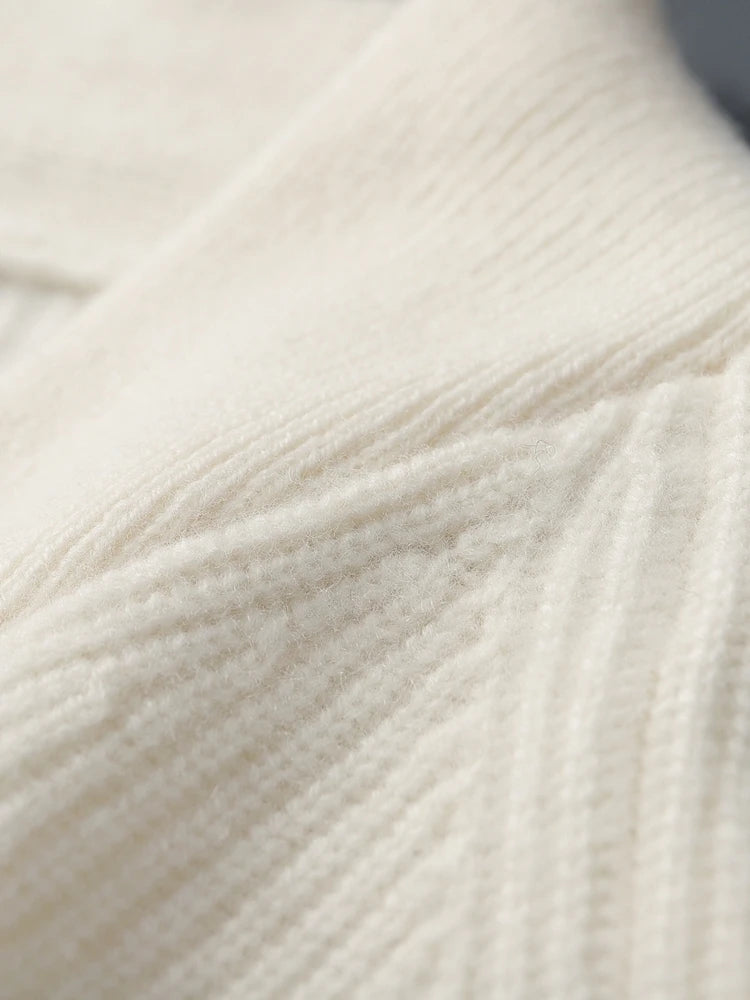 Raglan seaming detail of the men’s White Coffee cashmere sweater — From Borcelleclothes.