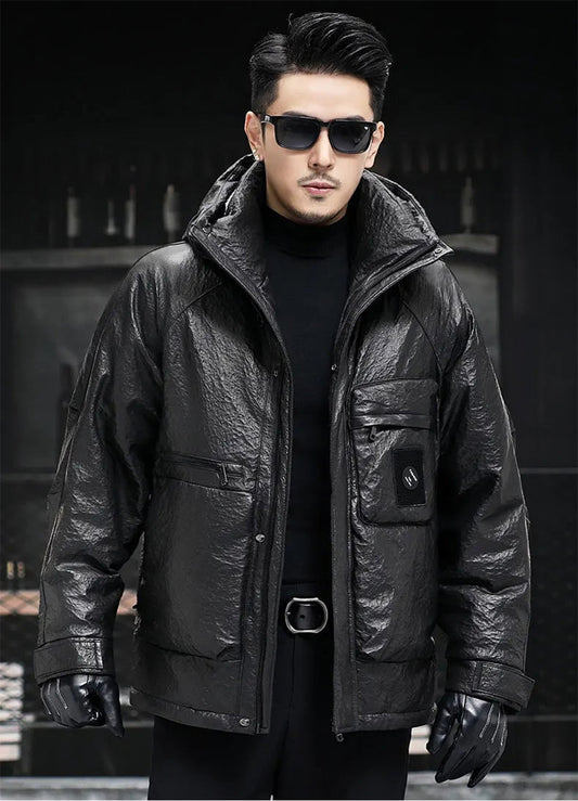 Man wearing a compressed cowhide down jacket in Onyx, standing straight to show the front silhouette — From Borcelleclothes.
