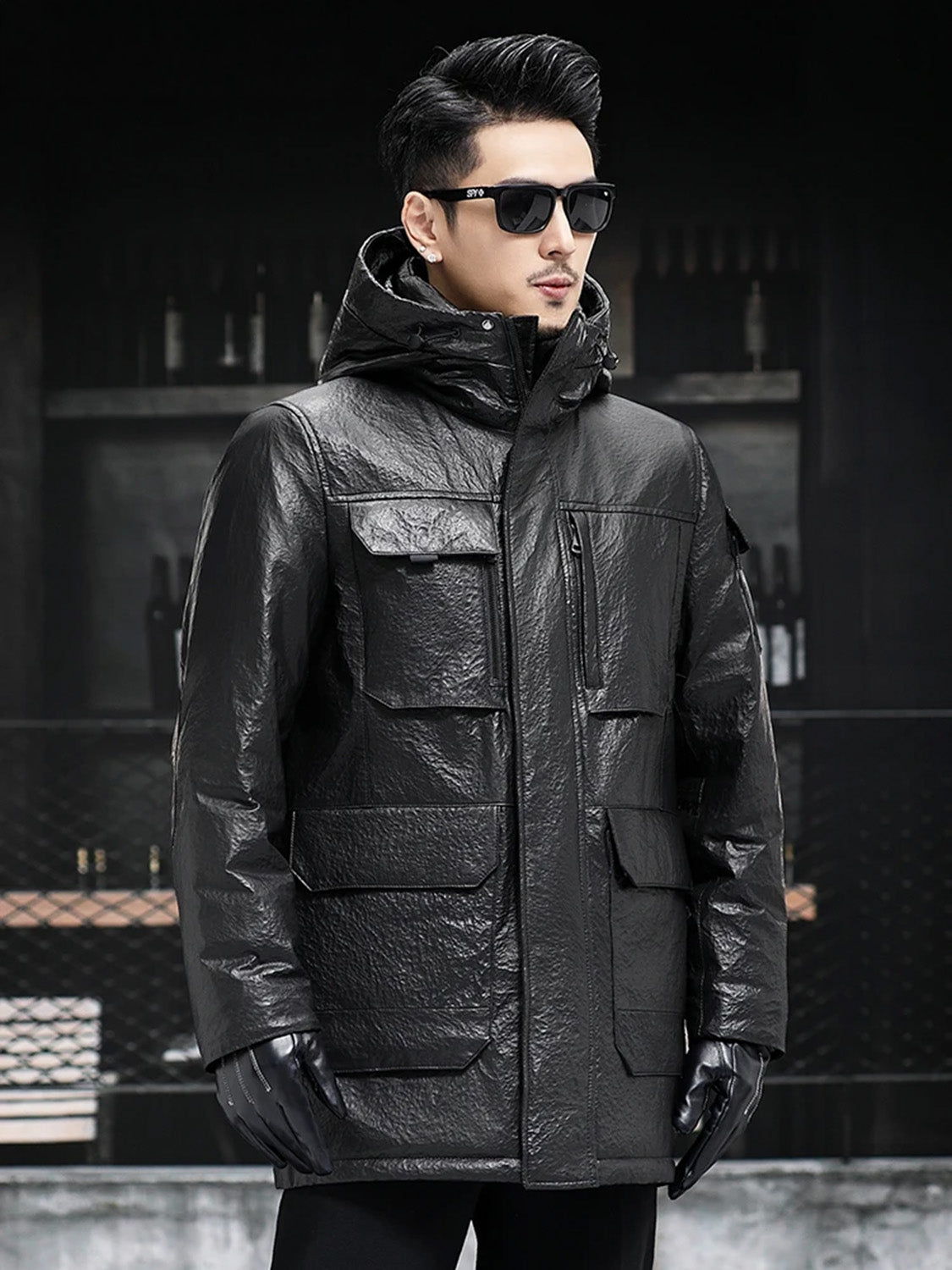 Side profile of the model in compressed cowhide jacket with patch pockets — From Borcelleclothes.